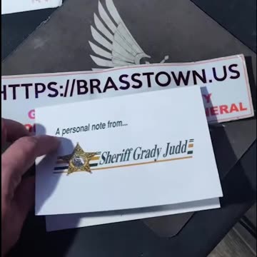 Delivered Bumper Sticker & Other items to Sheriff Grady Judd of Polk County