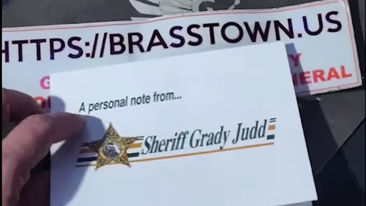 Delivered Bumper Sticker & Other items to Sheriff Grady Judd of Polk County