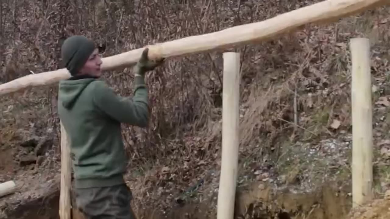 Man built a cabin in the mountains from start to finish.