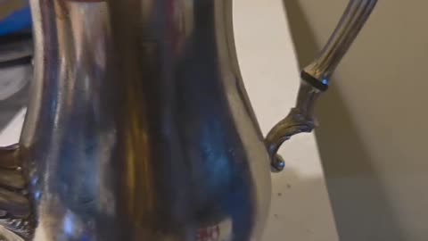 Silver tea pot polishing Before and After