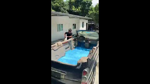 Demolished car to running pool