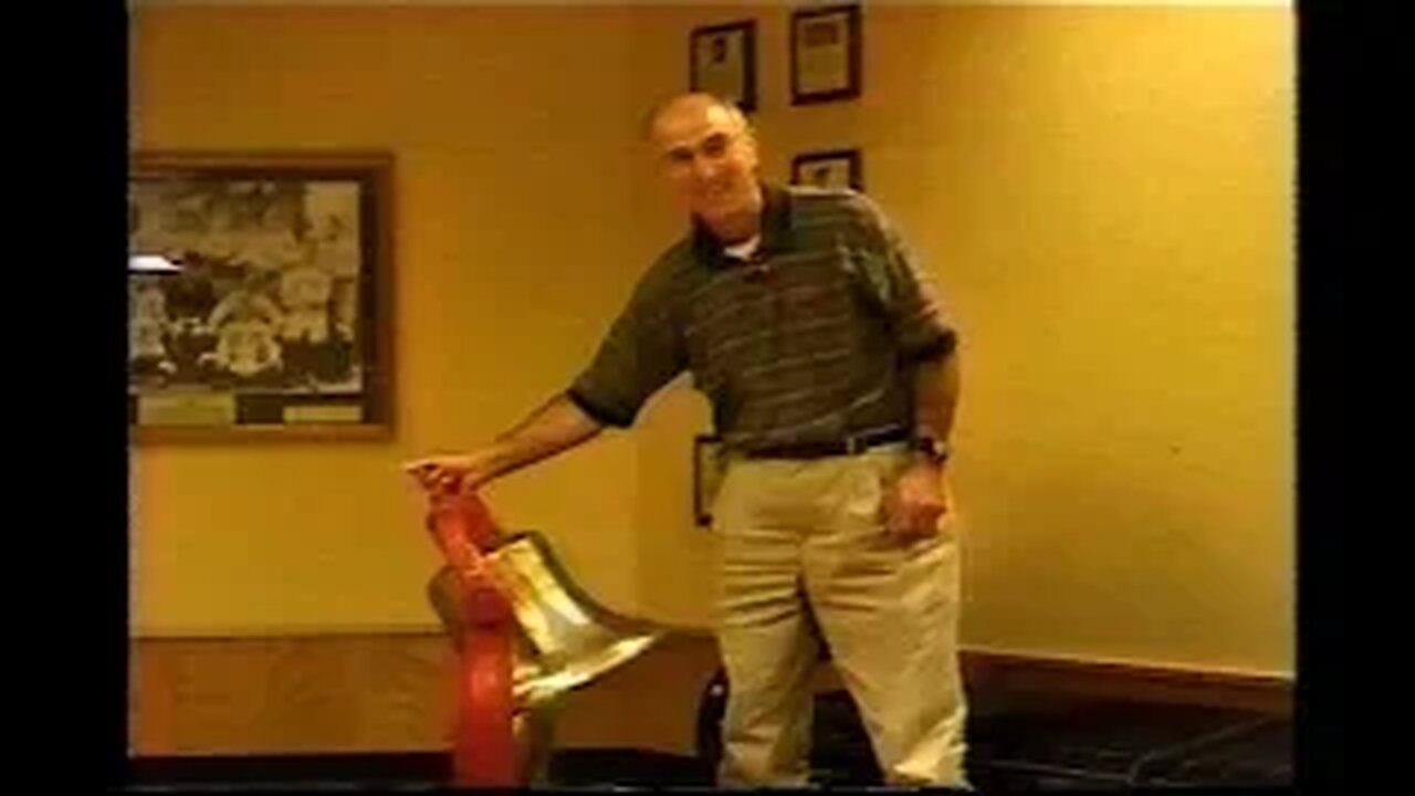 1990s - DePauw Coach Nick Mourouzis and the Monon Bell