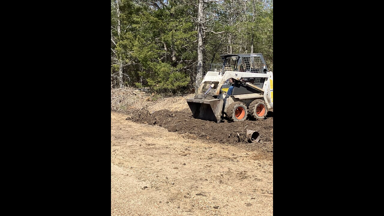 4-25, Bobcat at MO homestead, putting in culvert pipe.
