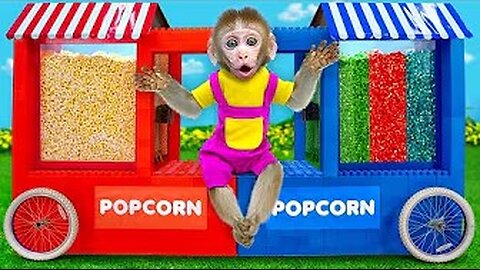 KiKi Monkey pretend play with Rainbow Popcorn Stand