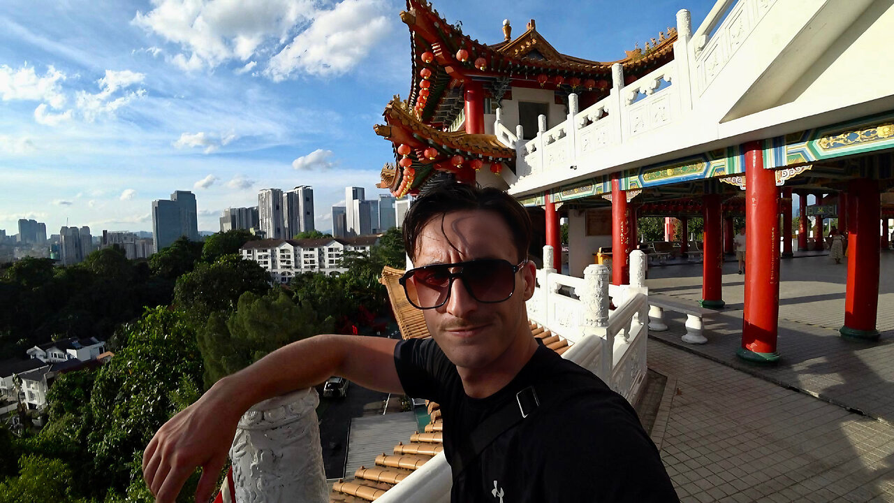 Can I survive riding a scooter in Kuala Lumpur?
