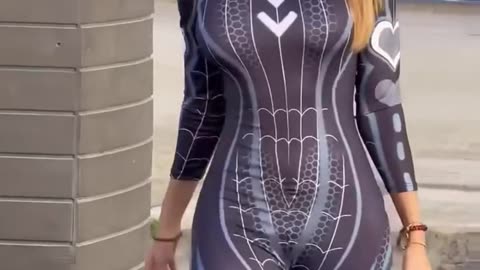 This black Spider Jumpsuit with futuristic design turns heads at the beach 🖤
