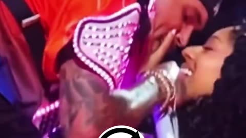 Chris brown kisses fan on stage