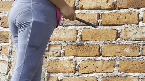 Woman Eats Brick Chips