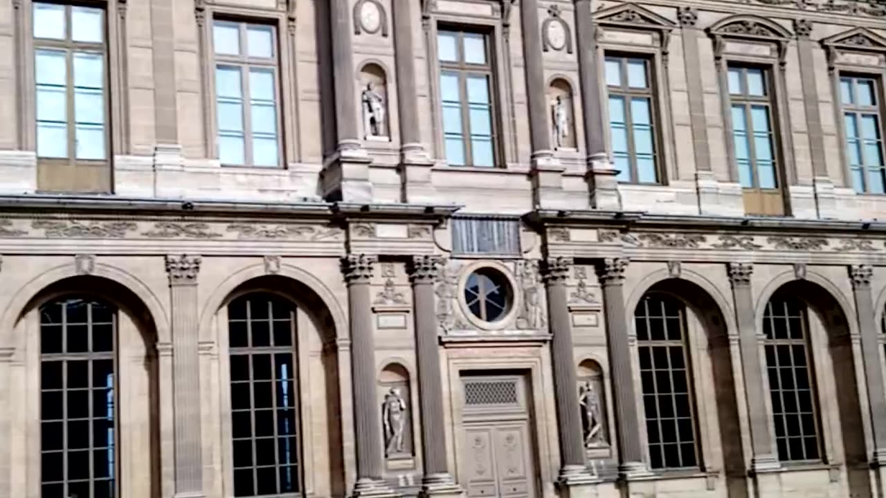 Outside the buildings that comprise the Louvre Museum