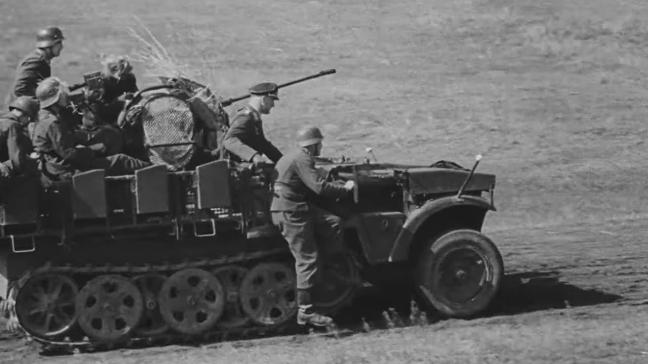 Mobile Flak gun crews training in the engagement of ground targets in 1943