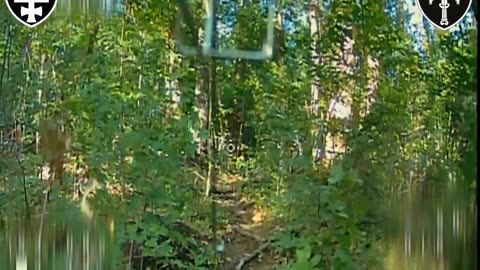 Ukrainian Fiber-Optic Drone Navigating Through Forest to Hit Russian Infantry Group