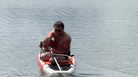 Dicaprio Lookalike Rides Paddle Board