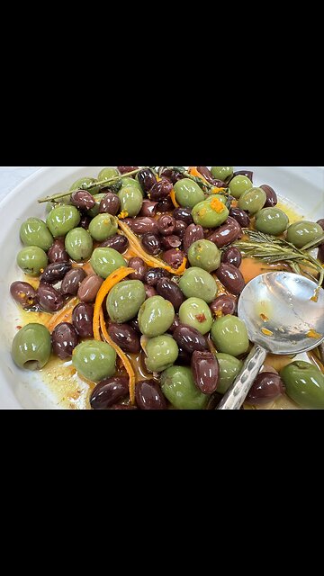 Zesty, Warm Mediterranean Olives with Orange Zest - Easy, Herby Appetizer