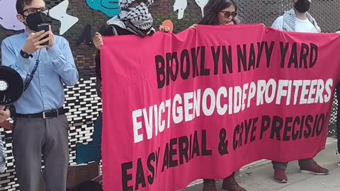 Peaceful New Yorkers outside the Brooklyn Navy Yard.