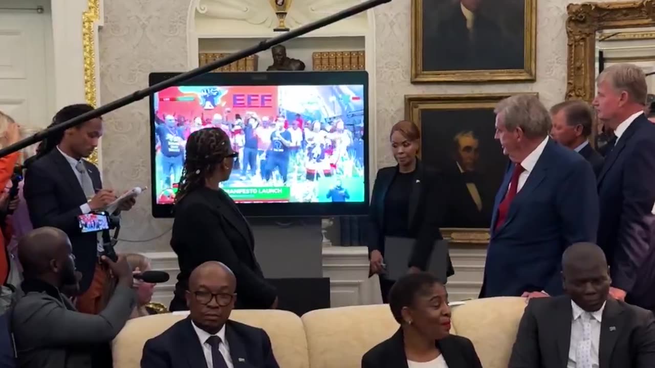 Watch the South Africans refuse to look at the TV as video evidence of White persecution plays