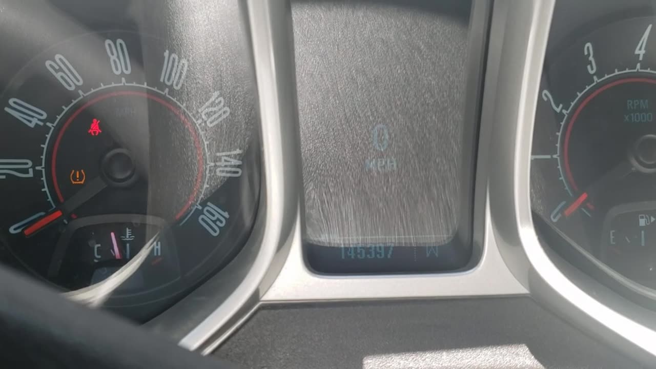 How to access the menu in a 2011 Camaro