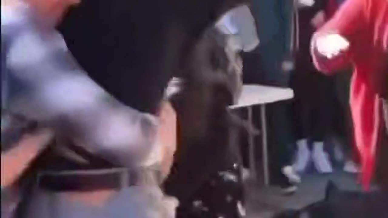 A fight between two kids on the school grounds.