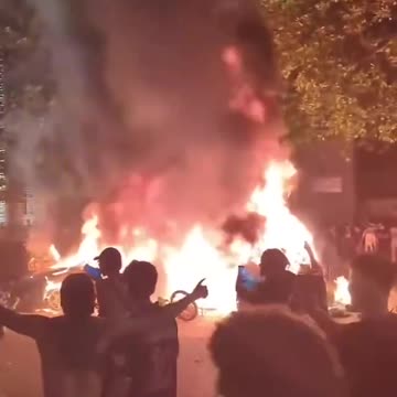 All Is Calm in Paris — Locals Sip Coffee Near Eiffel Tower... 😂