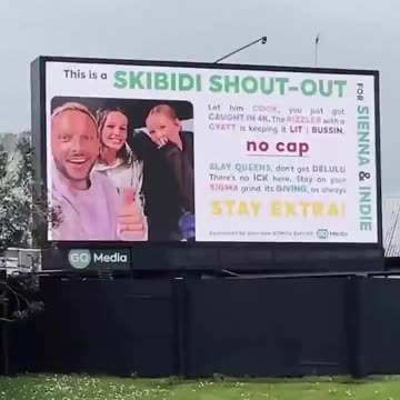 Father creates a billboard for his daughters.