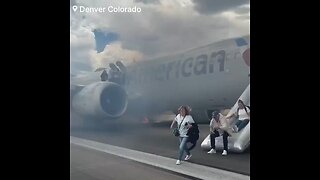🚨: Watch as People evacuate from a American Airlines jet after a left main wheels caught fire