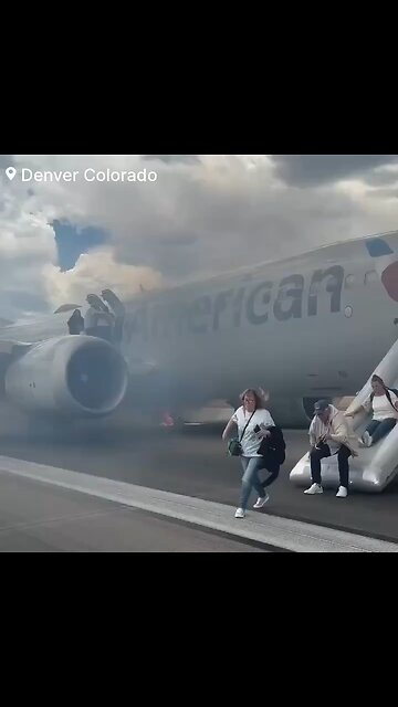 🚨: Watch as People evacuate from a American Airlines jet after a left main wheels caught fire