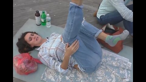Luodong Massages Beautiful Skinny White Woman On The Boardwalk