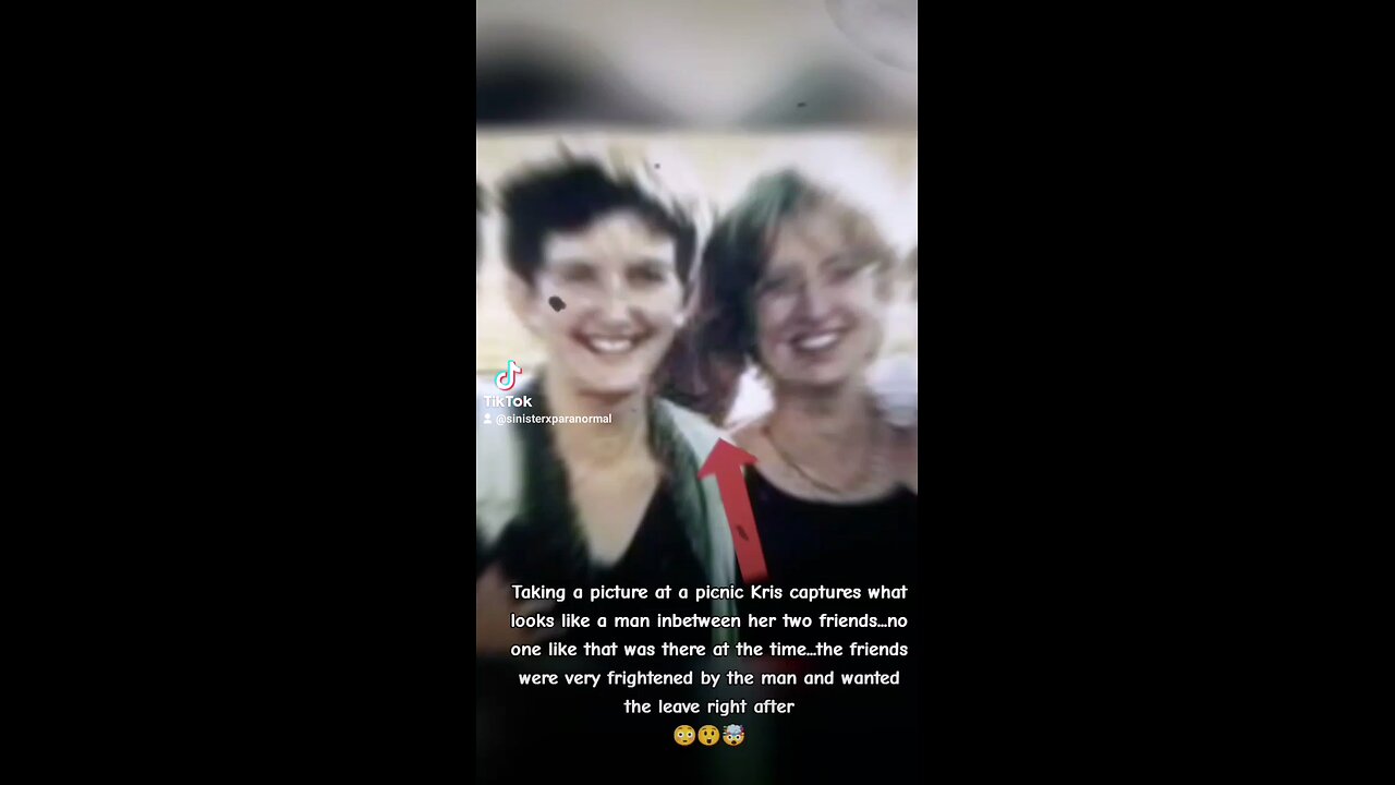 Ghost face captured between two friends