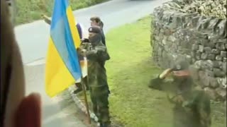 Ukrainian Soldiers Line The Streets and Salute Fallen Comrade and His Son