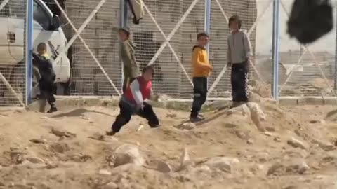 Children threatening to be decapitated in the ISIS jail camp