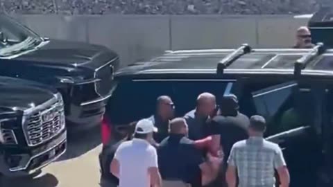 Footage of Charlie Being Rushed off University Campus After Being Shot [Graphic]
