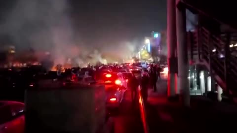 Fires burn, protesters chant as unrest grows across Iran