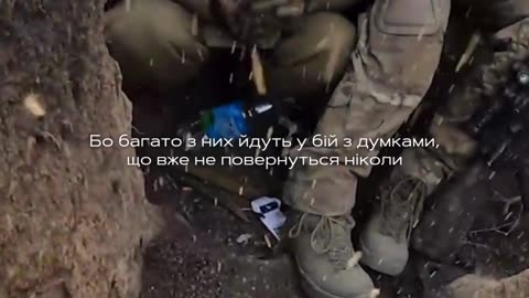 Intense Footage of Ukrainian Soldiers Evacuating Wounded