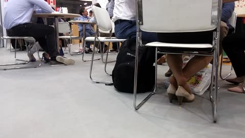 At a trade show meeting...