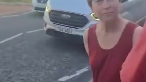 English patriots confront a group of leftists attempting to take down the English flag.