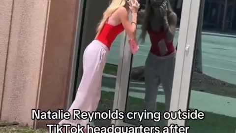 TikToker Natalie Reynolds crying and shouting outside of TikTok headquarters because she was banned.
