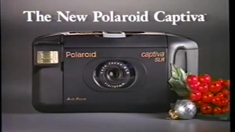 December 13, 1993 - Santa Loves the New Polaroid Captiva Camera