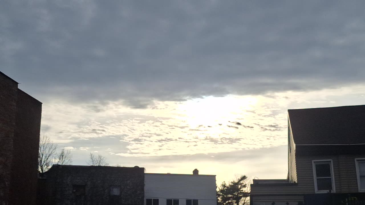 "Clouds" limiting light from the white sun(blue hue) and yellow sun