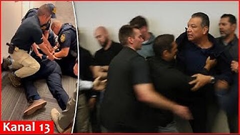 Police push to the ground and handcuff US senator who was removed from press conference