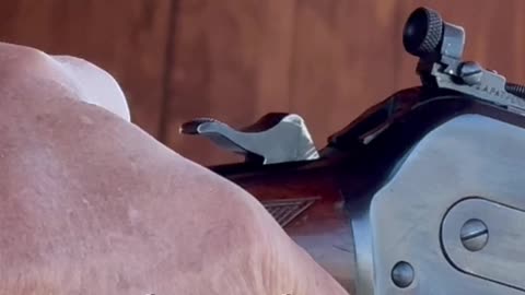 How a half-cock hammer position acts as a safety