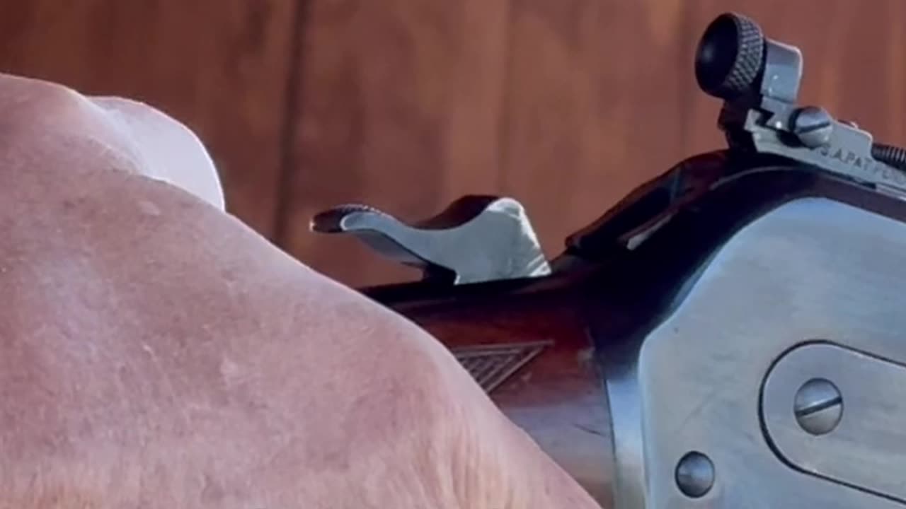 How a half-cock hammer position acts as a safety