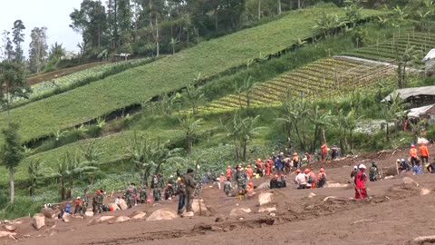 'Everything's gone': Indonesian boy searches for family lost in landslide