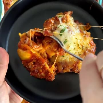 Lasagna aka Cheesy Baked Ravioli Lazy Lasagna, also known as Cheesy. #recipe #shorts #food
