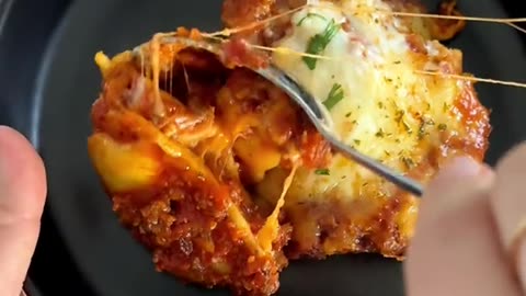 Lasagna aka Cheesy Baked Ravioli Lazy Lasagna, also known as Cheesy. #recipe #shorts #food