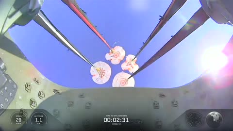 Dragon’s four main parachutes have deployed