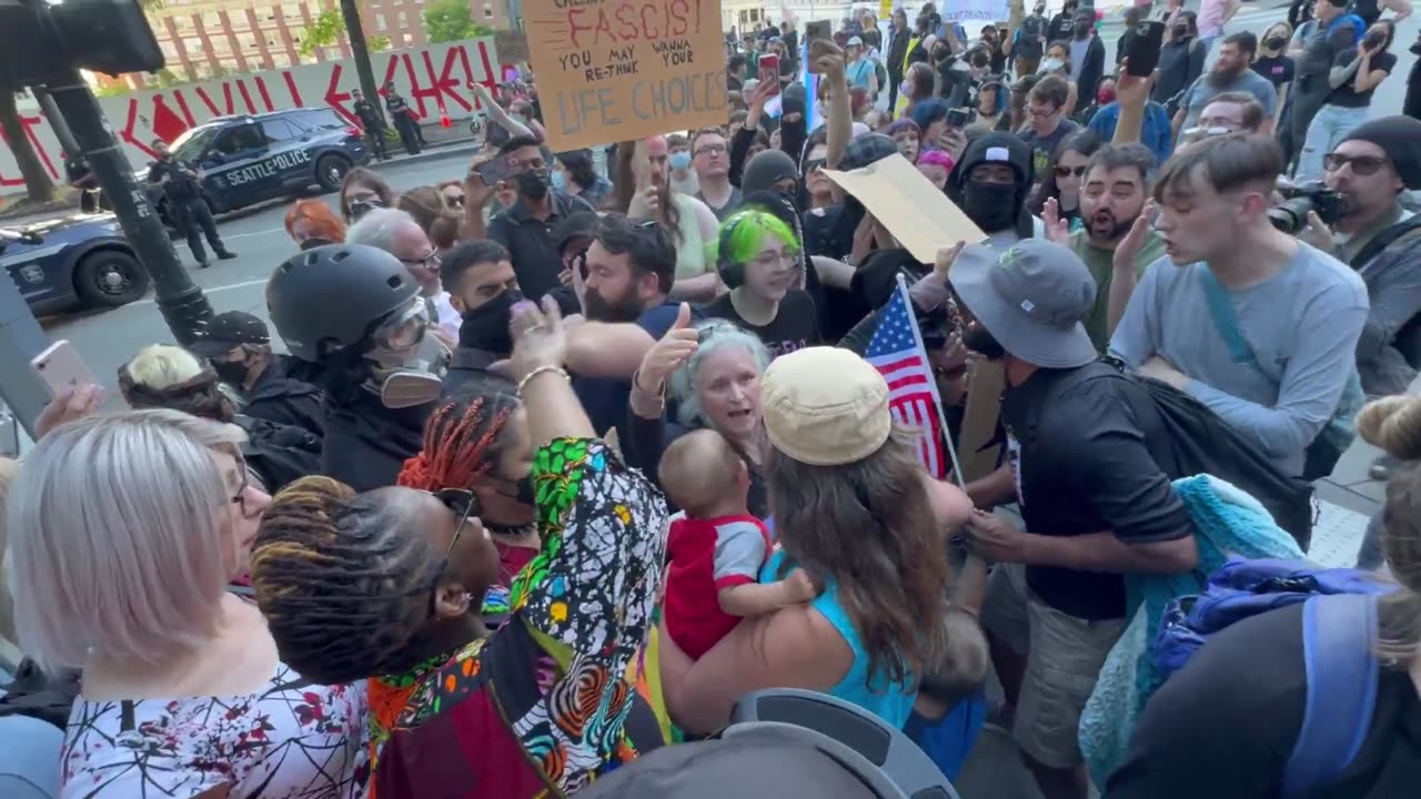 Antifa Surround Mother And Child