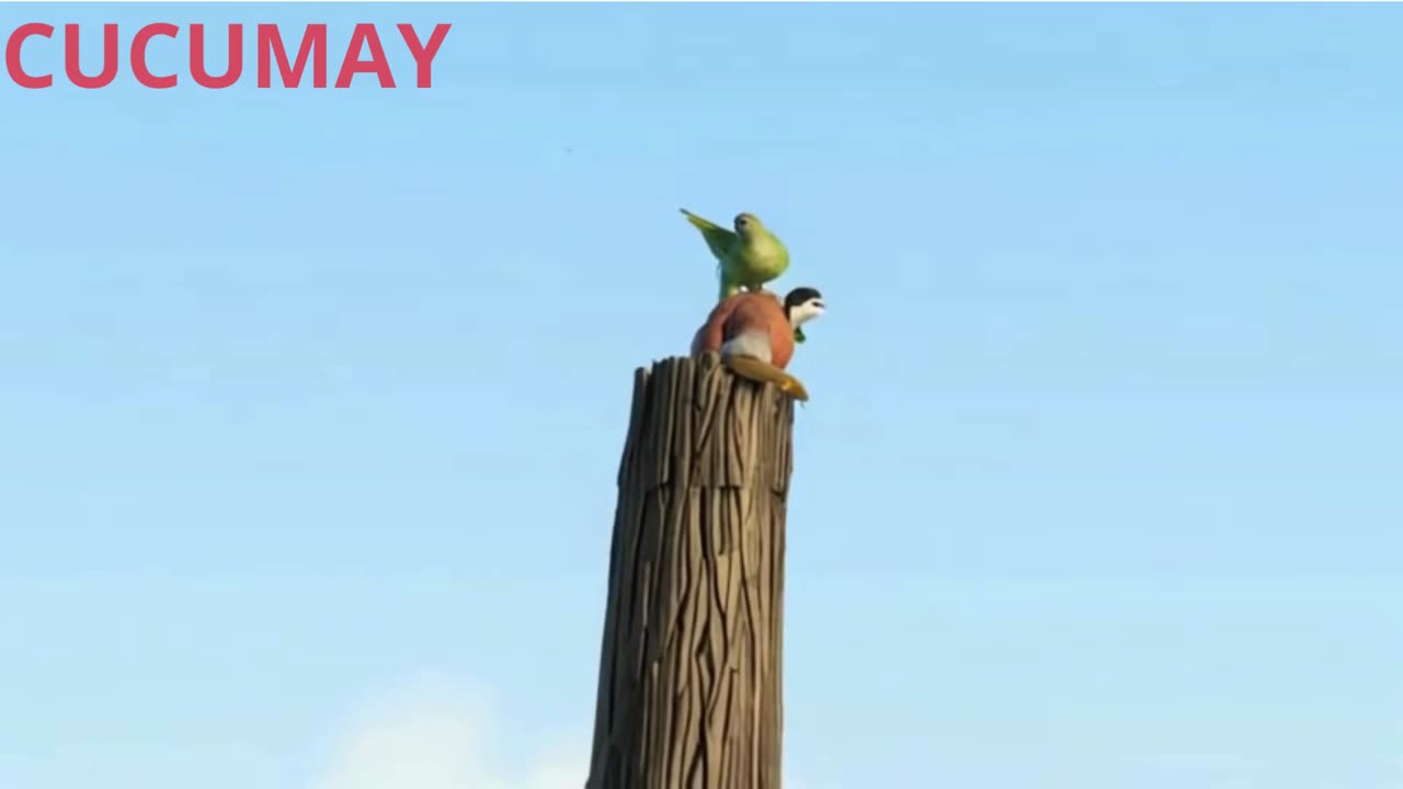 A small bird playing with its siblings on a felled tree