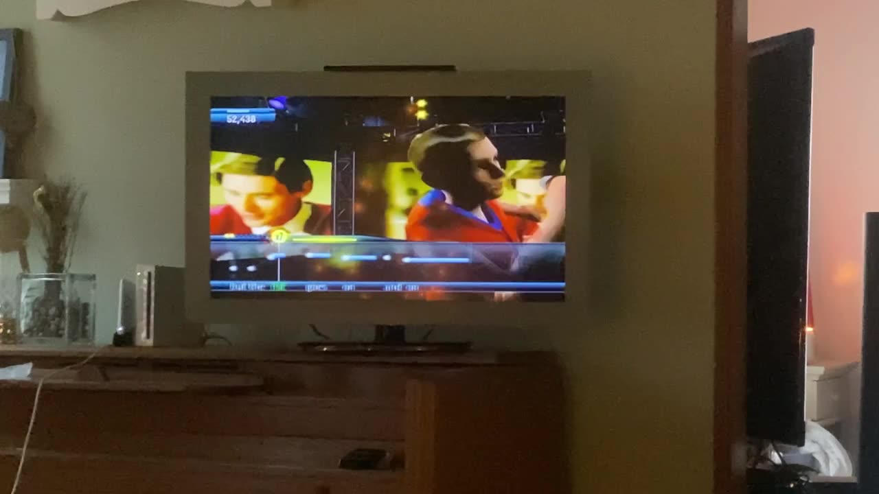Marti and I singing Karaoke Revolution on Wii