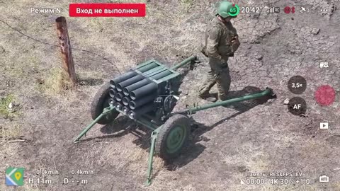 Far Eastern warriors and North Korean 107 mm Type 75 MLRS.