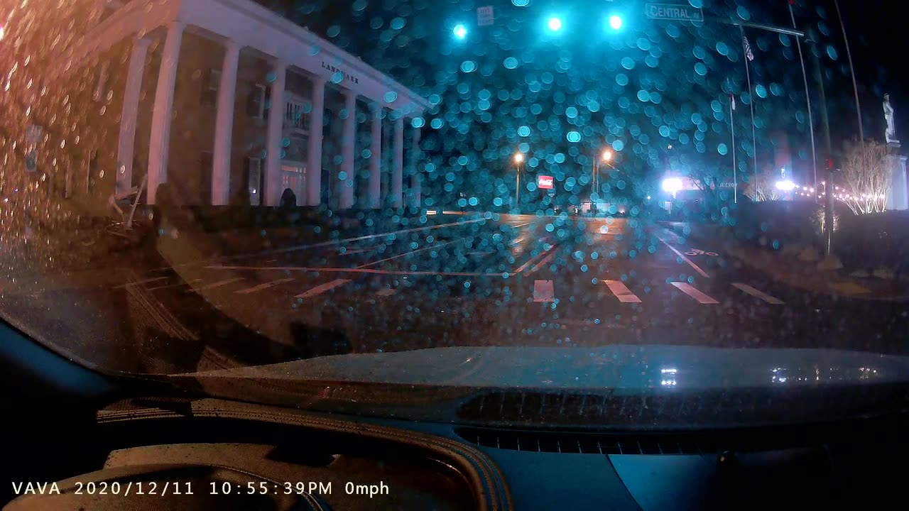 Cars Nearly Collide at Intersection Red light