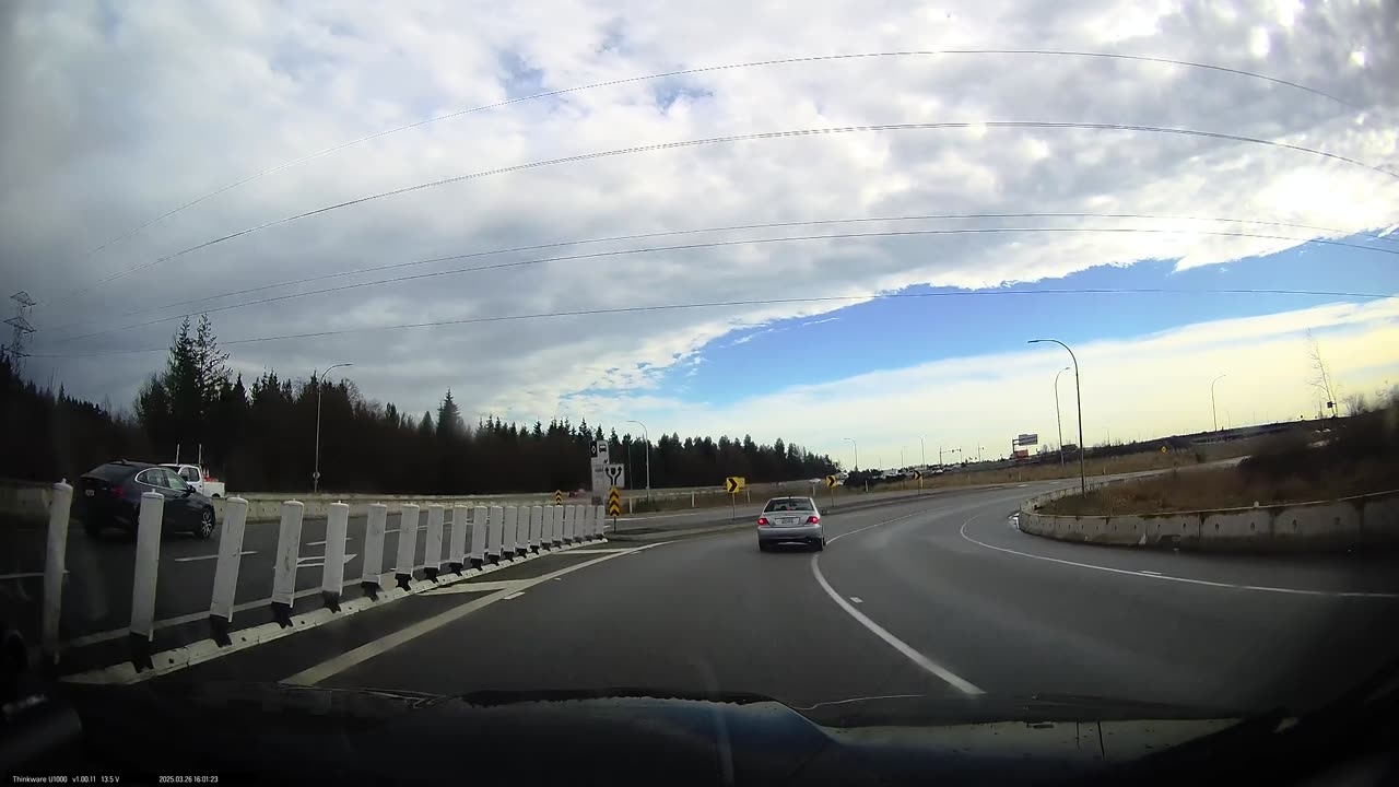 Dashcam Captures Car Swerving Onto MedianG